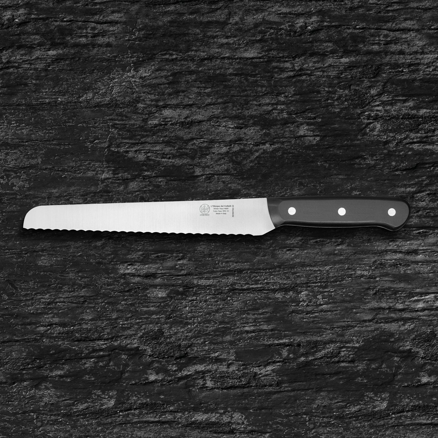 
                  
                    Serrated kitchen knife - Blade 8.66" - N690 stainless steel - Hrc 60 - black technical polymer handle
                  
                