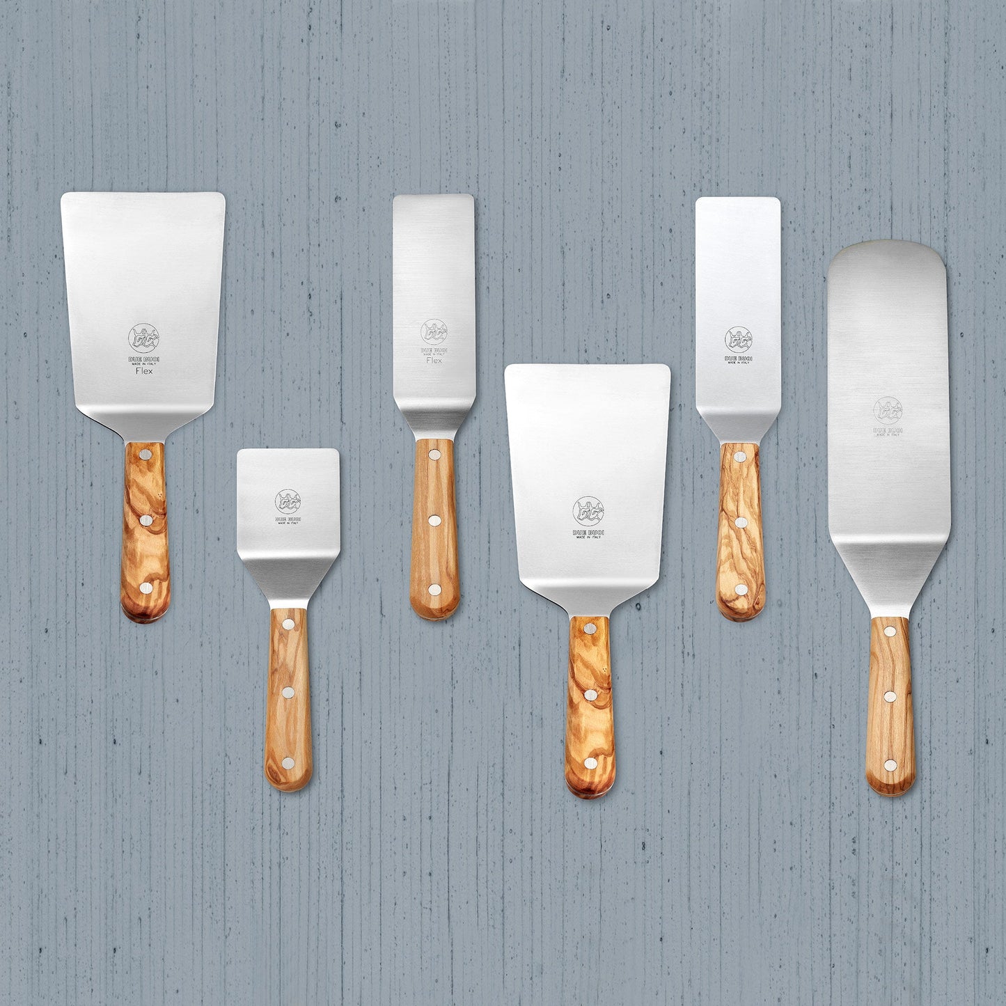 
                  
                    Set of 6 Stainless Steel Spatulas - Olive Wood Handle | DUE BUOI
                  
                